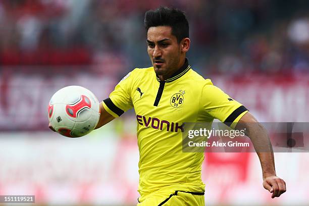 Ilkay Guendogan of Dortmund controles the ball during the Bundesliga match between 1. FC Nuernberg and Borussia Dortmund at Easy Credit Stadium on...