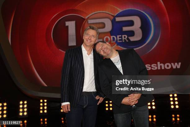 Joerg Pilawa and Elton Bach attend a photocall for '1, 2 oder 3 - Die Grosse Jubilaeumsshow' at Studios Berlin Adlershof on September 1, 2012 in...