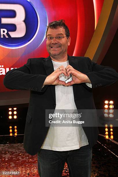 Elton attends a photocall for '1, 2 oder 3 - Die Grosse Jubilaeumsshow' at Studios Berlin Adlershof on September 1, 2012 in Berlin, Germany.