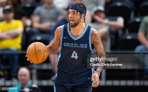 Timmy Allen of the Memphis Grizzlies brings the ball up the court against the Utah Jazz during the second half of the NBA Summer League game at the...