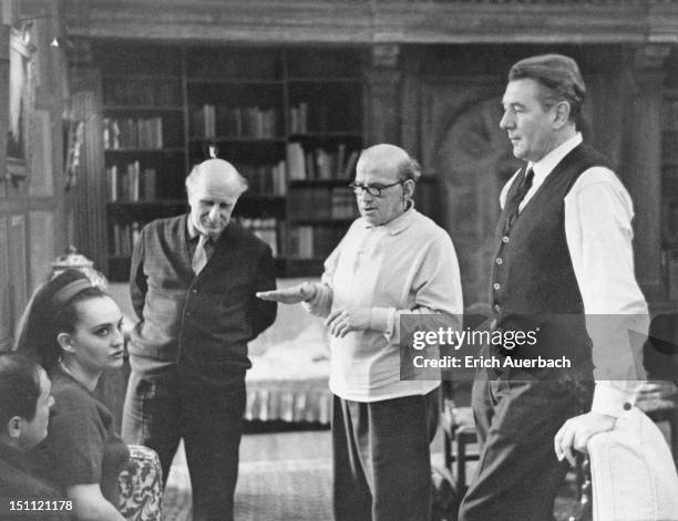 From left to right, Jean Brazzi, soprano Helia T'Hezan, Gerald Gover, Jani Strasser and English actor and director Sir Michael Redgrave talking in...