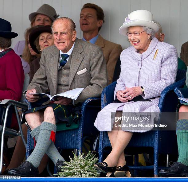 Prince Philip, Duke of Edinburgh and Queen Elizabeth II attend the 2012 Braemar Highland Gathering at The Princess Royal & Duke of Fife Memorial Park...