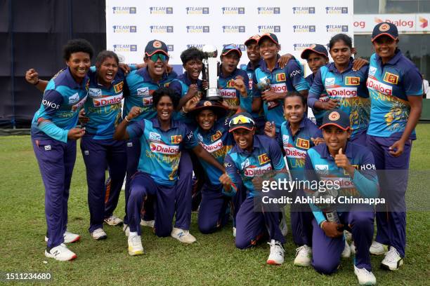 Sri Lanka players pose with the winners trophy after defeating New Zealand in the third One Day International match between Sri Lanka and New Zealand...