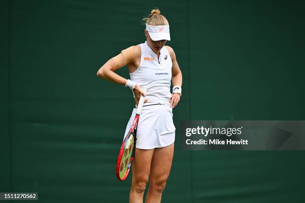 Harriet Dart of Great Britain looks dejected against Diane Parry of France in the Women's Singles first round match on day one of The Championships...