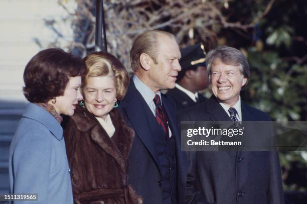President Gerald Ford and First Lady Betty Ford greet President-elect Jimmy Carter and wife Rosalynn at the White House in Washington, November 22nd...
