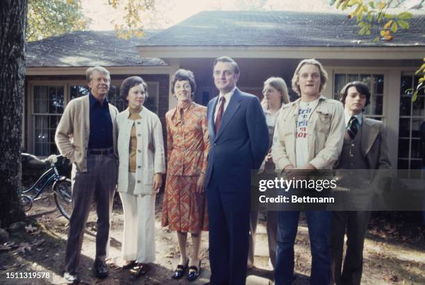 President-elect Jimmy Carter and his wife Rosalynn welcome Vice President-elect Water Mondale and his family to their house in Plains, Georgia,...
