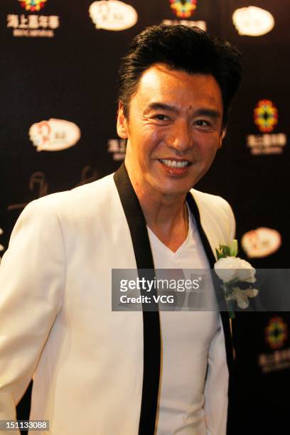 Hong Kong actor Kenny Bee attends a charity dinner held by the Sea Carnival Property Co., Ltd at Shangri-La Hotel on August 31, 2012 in Qingdao,...