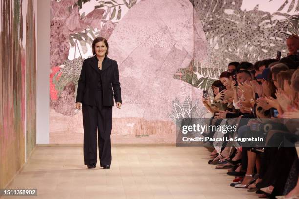 Designer Maria Grazia Chiuri acknowledges the applause of the audience after the Christian Dior Haute Couture Fall/Winter 2023/2024 show as part of...