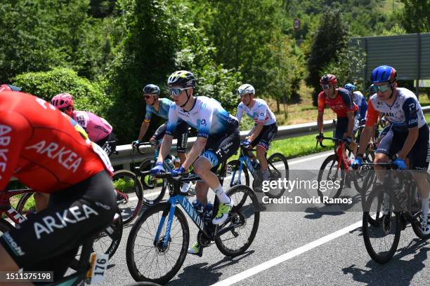 Matteo Jorgenson of The United States and Movistar Team and Simon Clarke of Australia and Team Israel-Premier Tech compete during the stage three of...