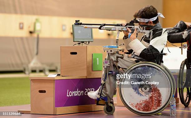 Tanguy De La Forest of France competes in the Mixed R4-10m Air Rifle Standing Shooting - SH2 final on day 4 of the London 2012 Paralympic Games at...