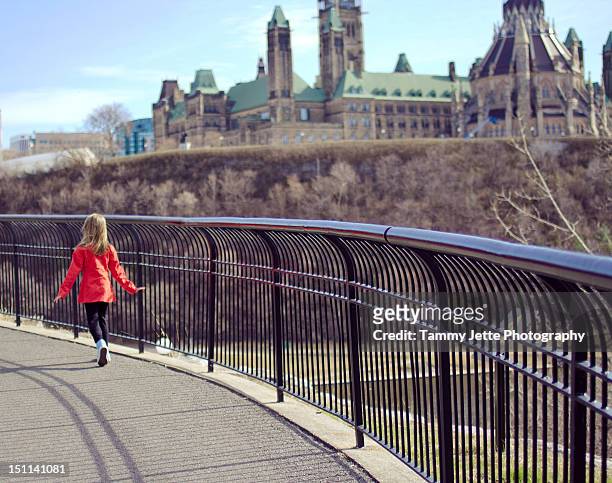 girl in red coat - canadian government stock pictures, royalty-free photos & images