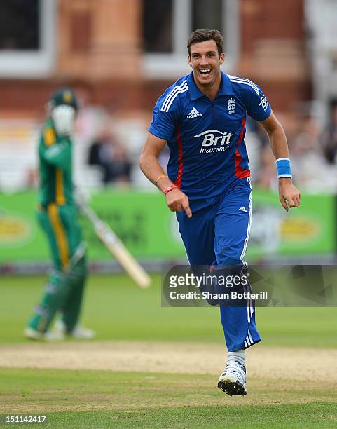 Steven Finn of England celebrates capturing the wicket of Ryan McLaren of South Africa during the 4th NatWest Series ODI match between England and...