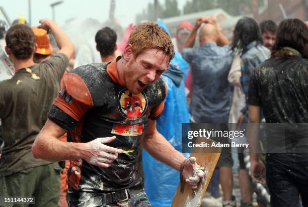 Participants fight in the the annual Vegetable Battle on the Oberbaumbruecke on September 2, 2012 in Berlin, Germany. The event pits Kreuzberg...