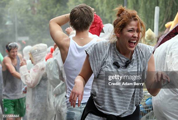 Participants fight in the the annual Vegetable Battle on the Oberbaumbruecke on September 2, 2012 in Berlin, Germany. The event pits Kreuzberg...