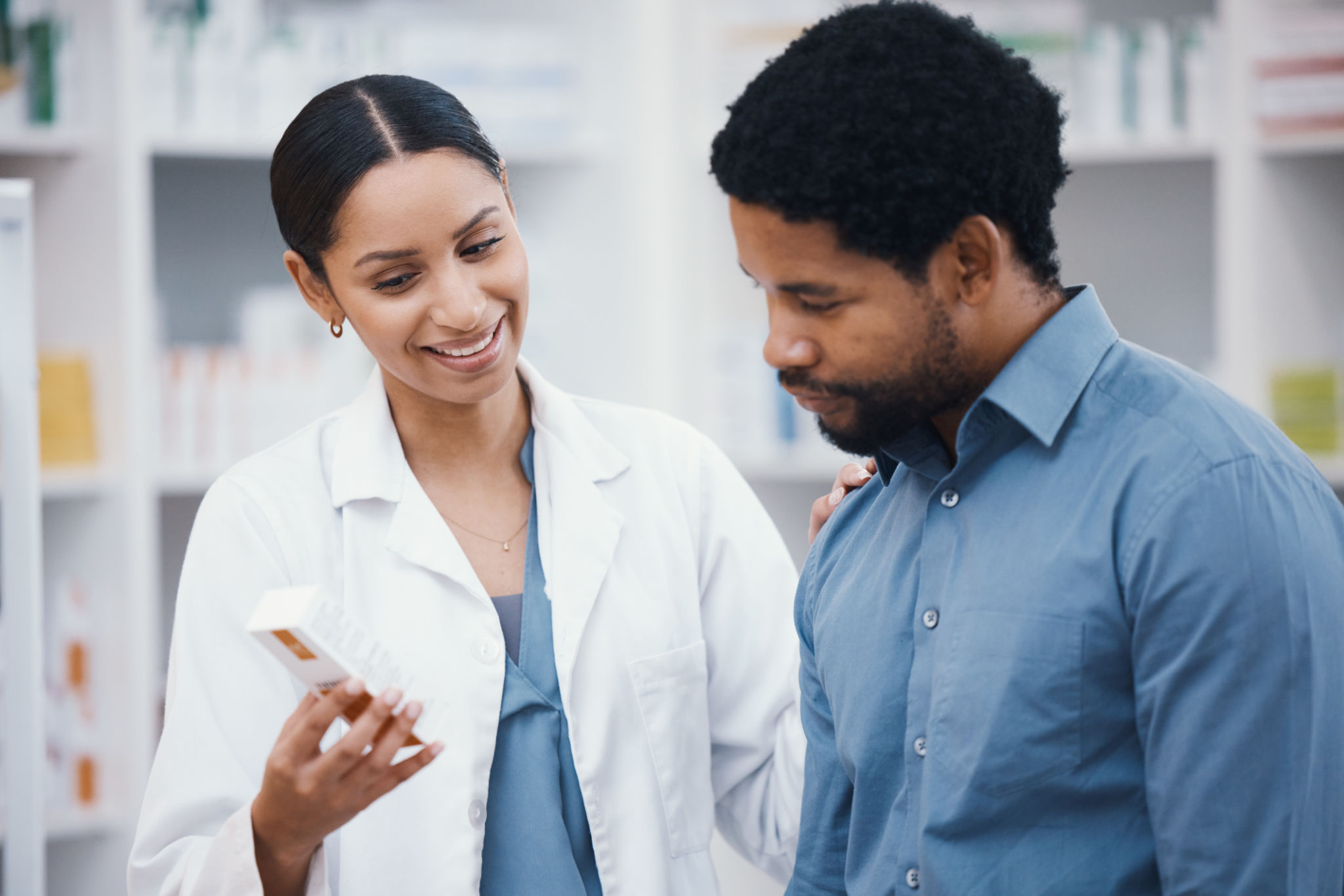 pharmacist helping patient