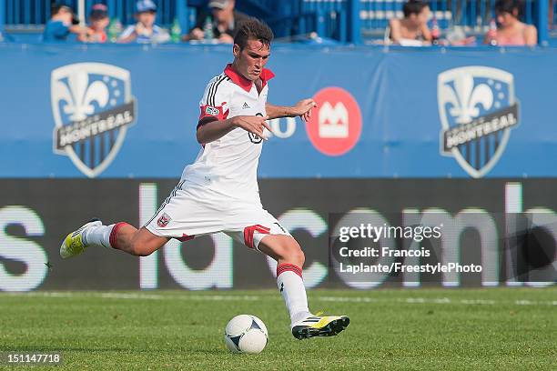 Emiliano Dudar of the D.C. United kicks the ball during the MLS match against the Montreal Impact at Saputo Stadium on August 25, 2012 in Montreal,...