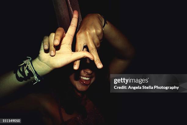 girl parting at night, los angeles - teenage hand signs stock pictures, royalty-free photos & images