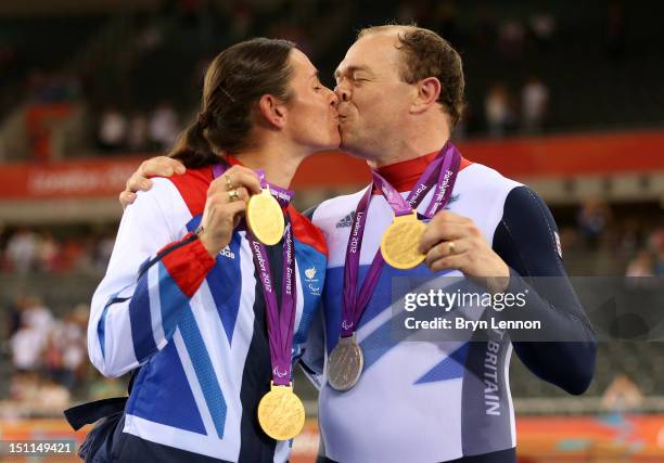 Husband and wife, Sarah and Barney Storey pose with the medals they have won in the Track Cycling events on day 4 of the London 2012 Paralympic Games...