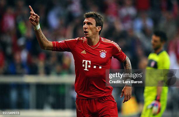 Mario Mandzukic of Muenchen celebrates after scoring hia teams fourth goal during the Bundesliga match between FC Bayern Muenchen and VfB Stuttgart...