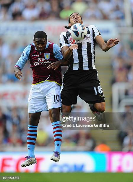 Jonas Gutierrez of Newcastle battles with Charles N'Zogbia of Aston Villa during the Barclays Premier League match between Newcastle United and Aston...