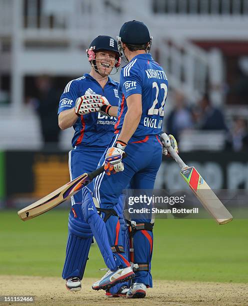 Eoin Morgan and Craig Kieswetter of England celebrate at the end of the 4th NatWest Series ODI match between England and South Africa at Lord's...