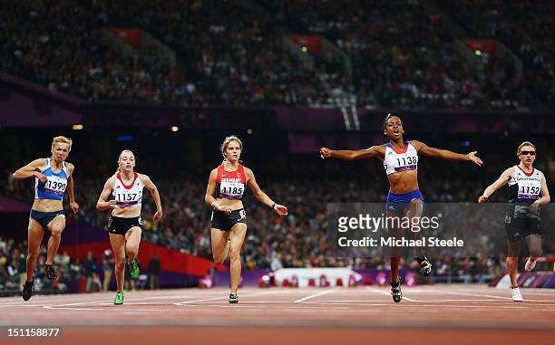 Mandy Franxois Elie of France crosses the line to win gold in the Women's 100m - T37 Final on day 4 of the London 2012 Paralympic Games at Olympic...