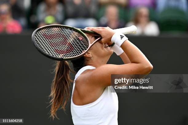 Jodie Burrage of Great Britain celebrates victory against Caty McNally of United States in the Women's Singles first round match on day one of The...