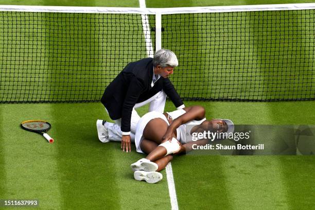 Venus Williams of United States goes down injured against Elina Svitolina of Ukraine in the Women's Singles first round match on day one of The...