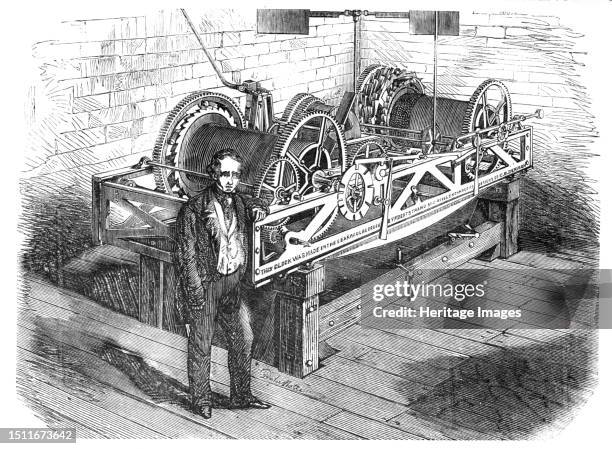 The New Houses of Parliament - the Great Clock at Westminster, 1857. Engraving 'from a photograph by Mr. Freeman De la Motte', showing the mechanism...