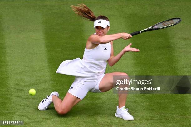 Elina Svitolina of Ukraine plays a forehand against Venus Williams of United States in the Women's Singles first round match on day one of The...