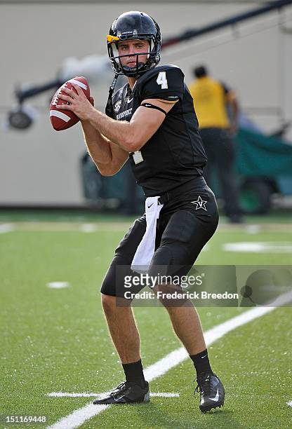 Patton Robinette of the Vanderbilt Commodores warms up prior to a game against the South Carolina Gamecocks at Vanderbilt Stadium on August 30, 2012...