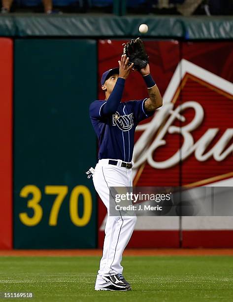 Outfielder Desmond Jennings of the Tampa Bay Rays catches a fly ball against the Oakland Athletics during the game at Tropicana Field on August 25,...