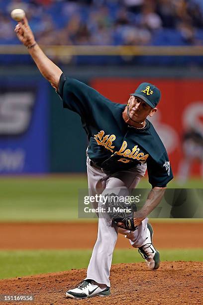 Pitcher Grant Balfour of the Oakland Athletics pitches against the Tampa Bay Rays during the game at Tropicana Field on August 24, 2012 in St....
