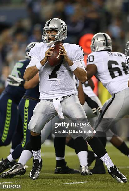 Quarterback Matt Leinart of the Oakland Raiders looks to pass against the Seattle Seahawks at CenturyLink Field on August 30, 2012 in Seattle,...