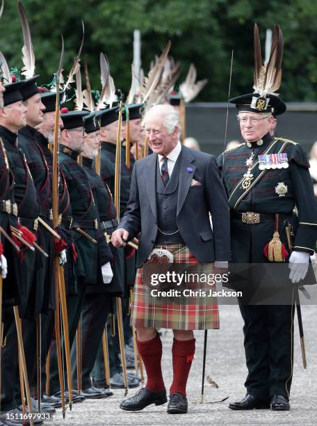 King Charles III reviews the Royal Company of Archers during the Ceremony of Keys on the forecourt of the Palace of Holyroodhouse on July 03, 2023 in...