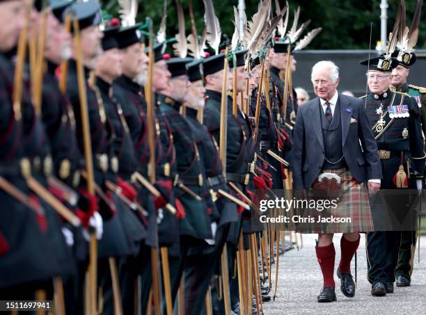 King Charles III reviews the Royal Company of Archers during the Ceremony of Keys on the forecourt of the Palace of Holyroodhouse on July 03, 2023 in...