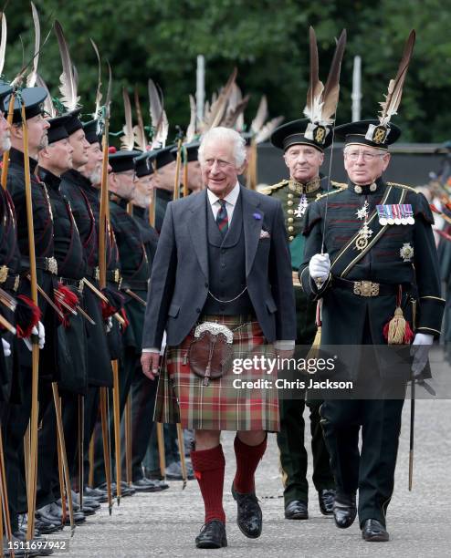 King Charles III reviews the Royal Company of Archers during the Ceremony of Keys on the forecourt of the Palace of Holyroodhouse on July 03, 2023 in...