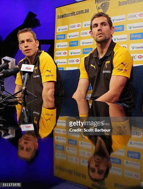 Alastair Clarkson and Luke Hodge of the Hawthorn Hawks speak to the media during the 2012 AFL Finals Series Launch at the Melbourne Fox Sports...