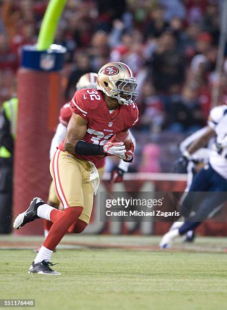 Darcel McBath of the San Francisco 49ers runs after making a reception during the game against the San Diego Chargers at Candlestick Park on August...