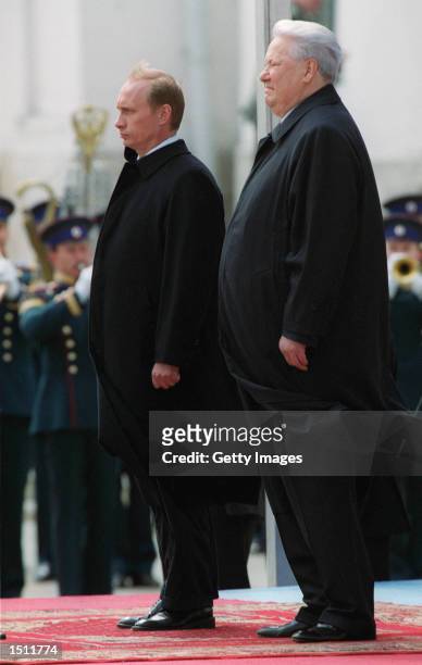 Russian President Vladimir Putin, left, and former Russian President Boris Yeltsin attend an inauguration ceremony for Putin May 7, 2000 in the...