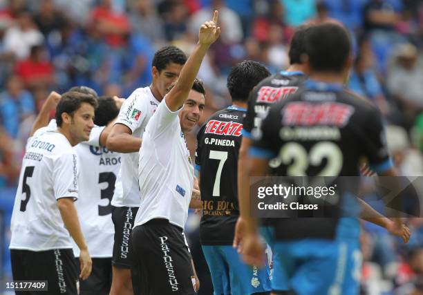 Esteban Paredes of Atlante celebrate a goal during a match between Queretaro and Atlante as part of the Torneo Apertura 2012 at La Corregidora...