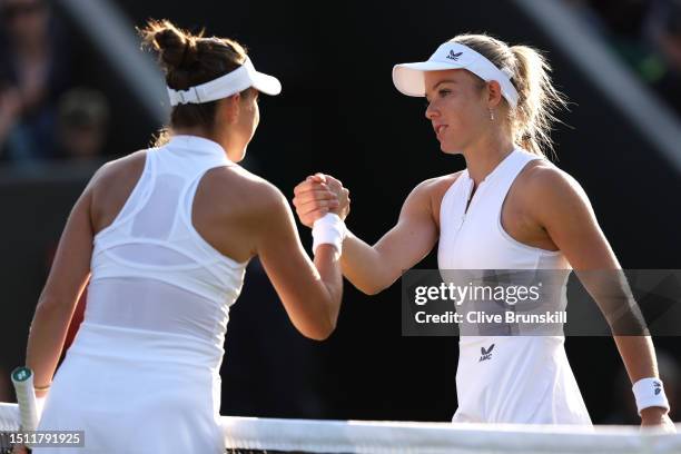 Katie Swan of Great Britain congratulates Belinda Bencic of Switzerland on her victory after the Women's Singles first round match on day one of The...