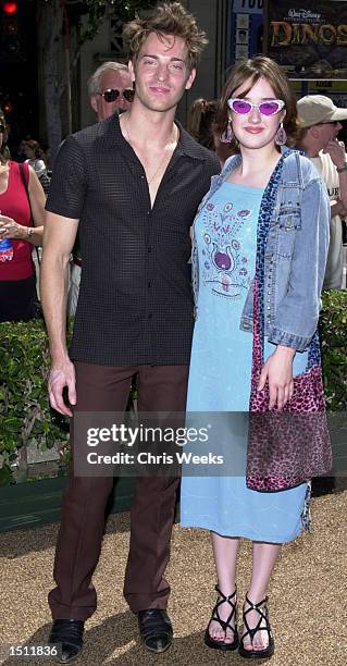 Actress Ashley Johnson and Matthew Arais attend the premiere May 13, 2000 of Disney's "Dinosaur" in Hollywood, CA.