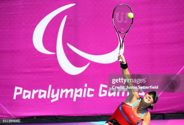 Katharina Kruger of Germany serves during her Women's Singles Wheelchair Tennis match against Esther Vergeer of the Netherlands on Day 5 of the...