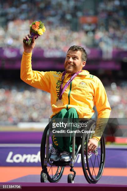 Silver medalist Kurt Fearnley of Australia poses on the podium during the medal ceremony for the Men's 5000m - T54on day 5 of the London 2012...
