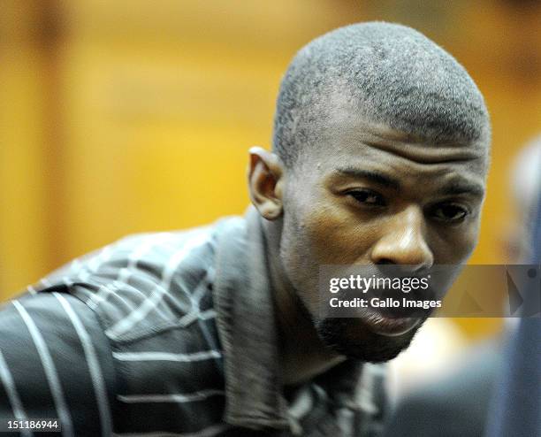 Xolile Mngeni appears at the Cape Town High Court, on September 3, 2012 in Cape Town, South Africa. He is accused of being involved in the murder of...