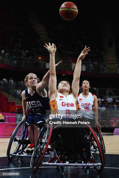 Rose Hollermann of the United States defends against Man Liu of China for the ball during the Women's Wheelchair Basketball Preliminary Group B match...