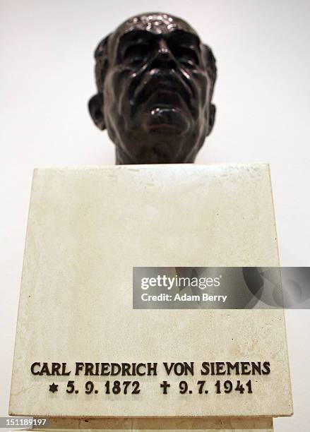 Bust of Carl Friedrich von Siemens, responsible for the resurrection of the Siemens Group after the First World War, sits on display at a Siemens...