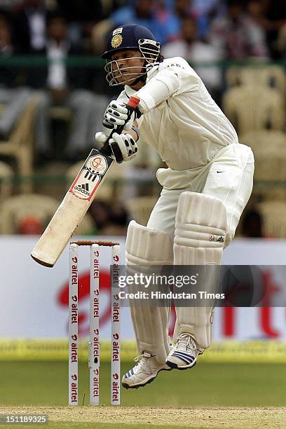 Indian batsman Sachin Tendulkar plays a shot against New Zealand during fourth day of second Test Match at M Chinnaswamy stadium on September 3, 2012...