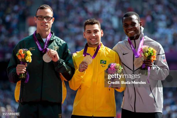 Silver medalist Oscar Pistorius from South Africa , gold medalist Alan Fonteles Cardoso Oliveira from Brazil and bronze medalist Blake Leeper from...